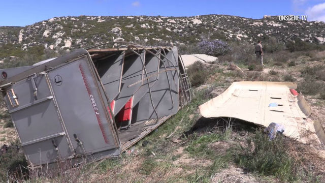 The wreckage of the horse trailer.