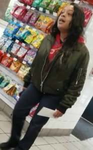 The woman who appears to physically attack