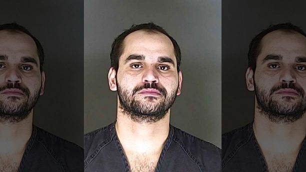 Karrar Noaman Al Khammasi, 31, is accused of shooting Colorado Springs office