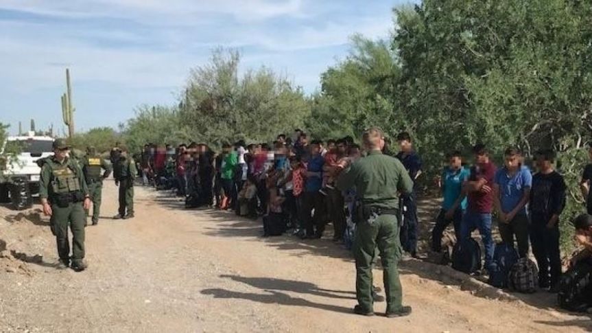 Border Patrol agents stopped on Friday a caravan of 128 people