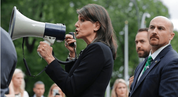 Surrounded by security, United States Ambassador to the United Nations Nikki Haley 