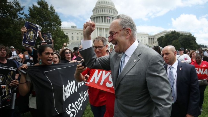 schumerchuck_w_protesters_10242018