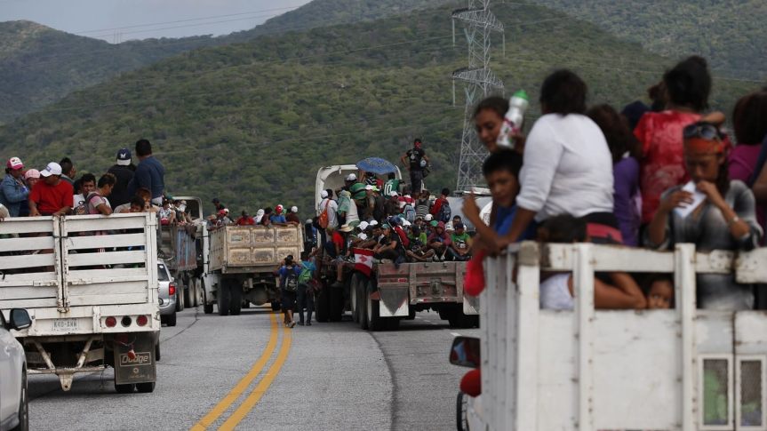 Migrants hitch rides