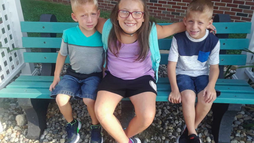 Alivia Stahl, center, and her twin brothers, Xzavier and Mason Ingle.