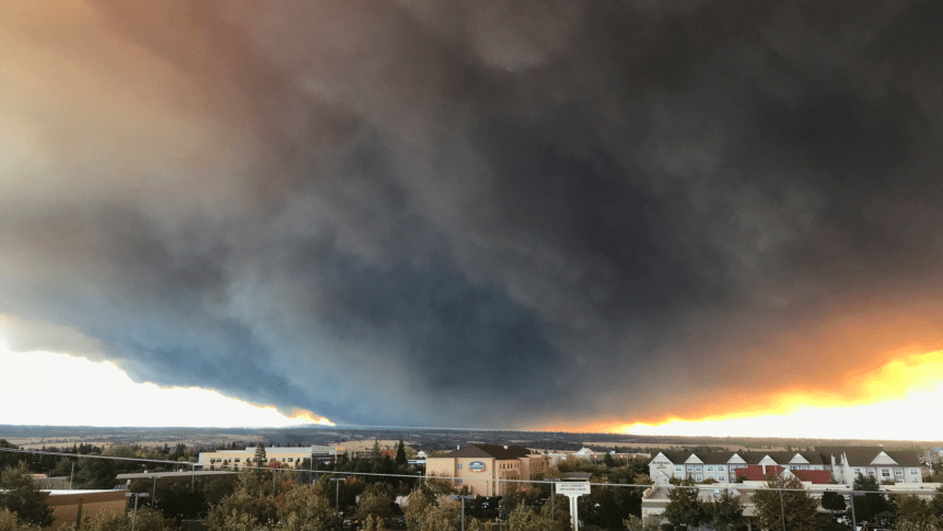 The massive plume from the Camp Fire, burning in the Feather River Canyon near Paradise, Calif.,