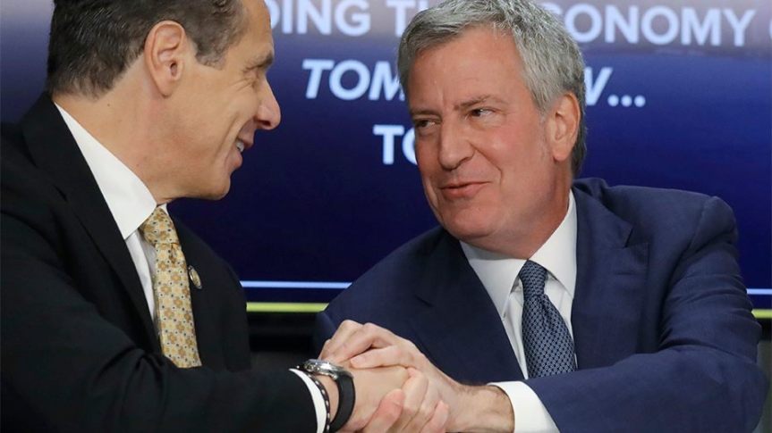 New York Gov. Andrew Cuomo, left, and New York City Mayor Bill de Blasio