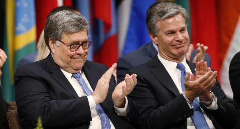 Attorney General William Barr, left with FBI director Christopher Wray, right,
