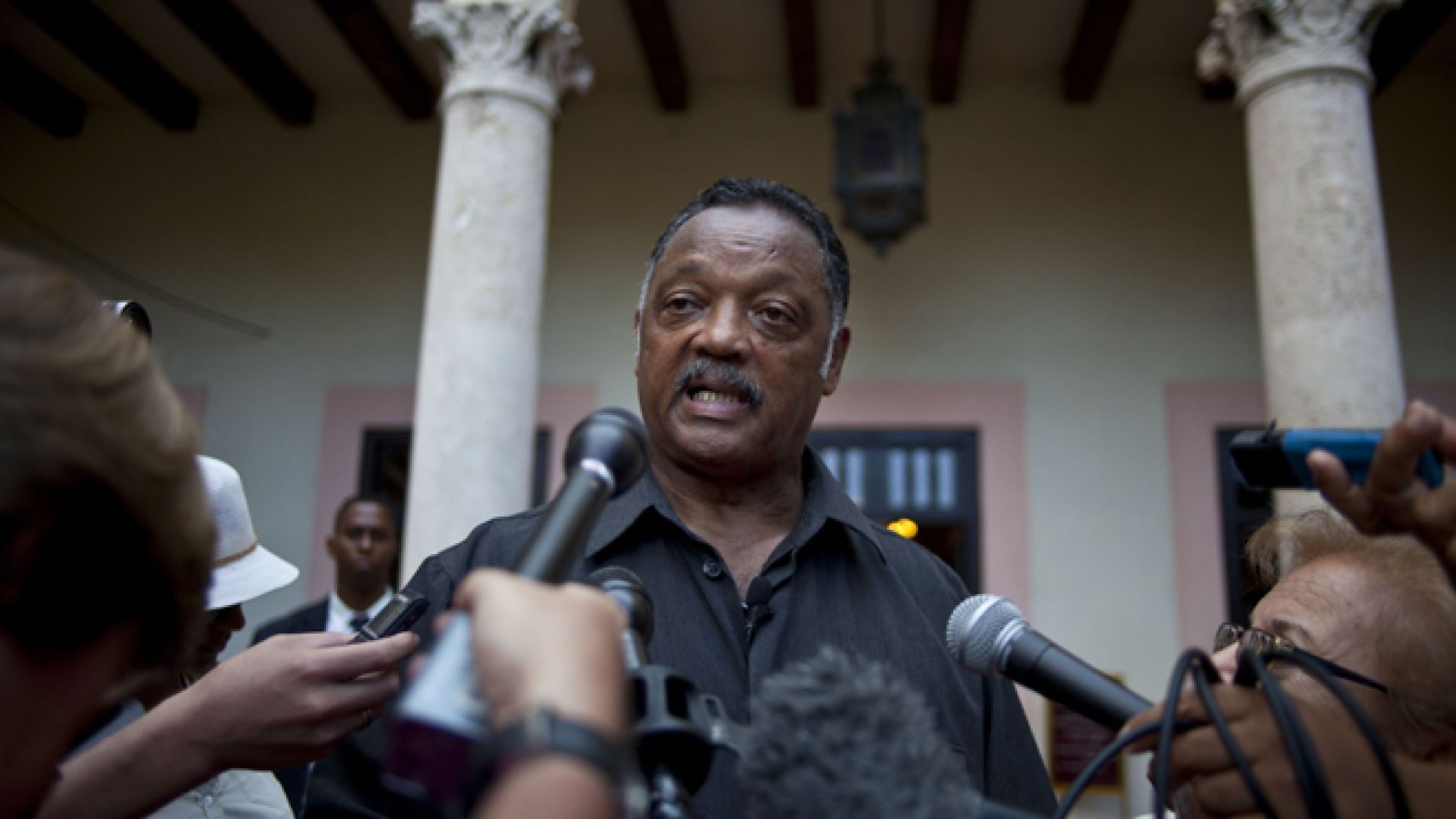 The Rev. Jesse Jackson talks with journalists in 2013. (AP)