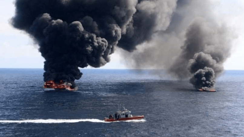 The Coast Guard stands watch as vessels seized for smuggling drugs are scuttled and sunk into the Pacific Ocean in May. (U.S. Coast Guard/Released)