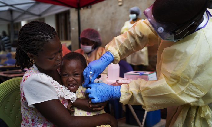 A child is vaccinated against Ebola in Beni, Congo on July 13, 2019. (Jerome Delay/AP Photo)