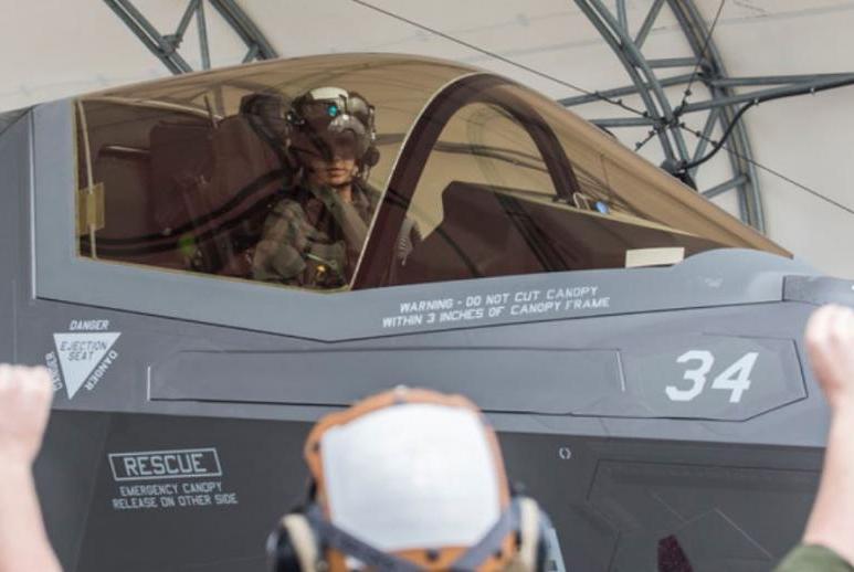Capt. Anneliese Satz is the first female member of the U.S. Marine Corps to complete the basic course in flying the F-35B Lightning II Joint Strike Fighter plane.