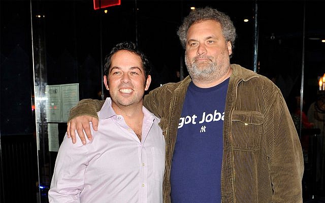 David Kimowitz, left, with comedian Artie Lange, attends the grand opening of The Stand comedy club in New York City, 