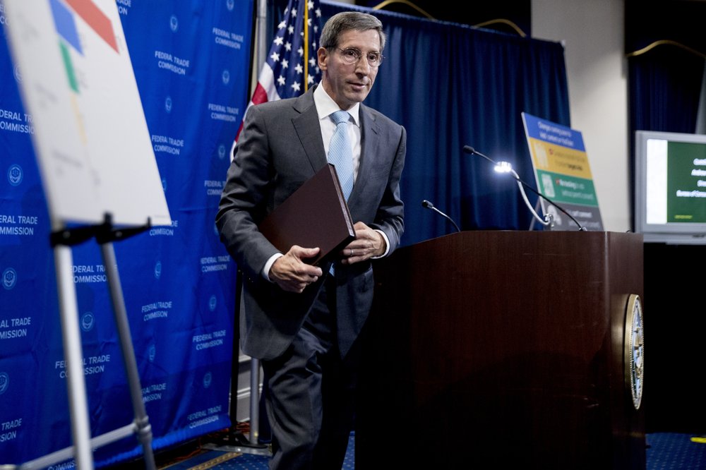 Federal Trade Commission Chairman Joe Simons departs after speaking at a news conference at the Federal Trade Commission in Washington, Wednesday, Sept. 4, 2019, 