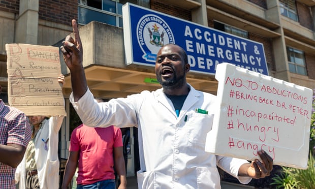Doctors protest outside Parirenyatwa hospital in Harare on Sunday,