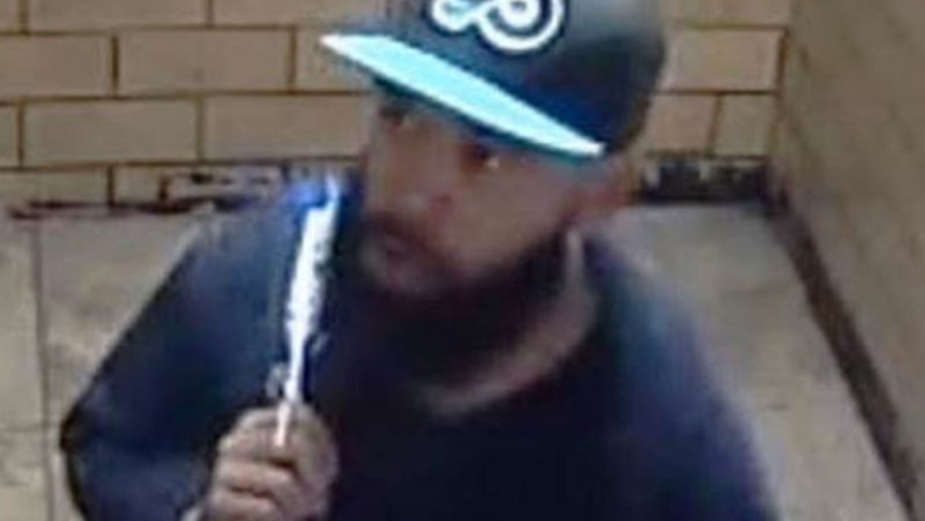 Surveillance footage of the alleged suspect who forced his way inside an elderly woman’s apartment on Saturday and stole $5,000.