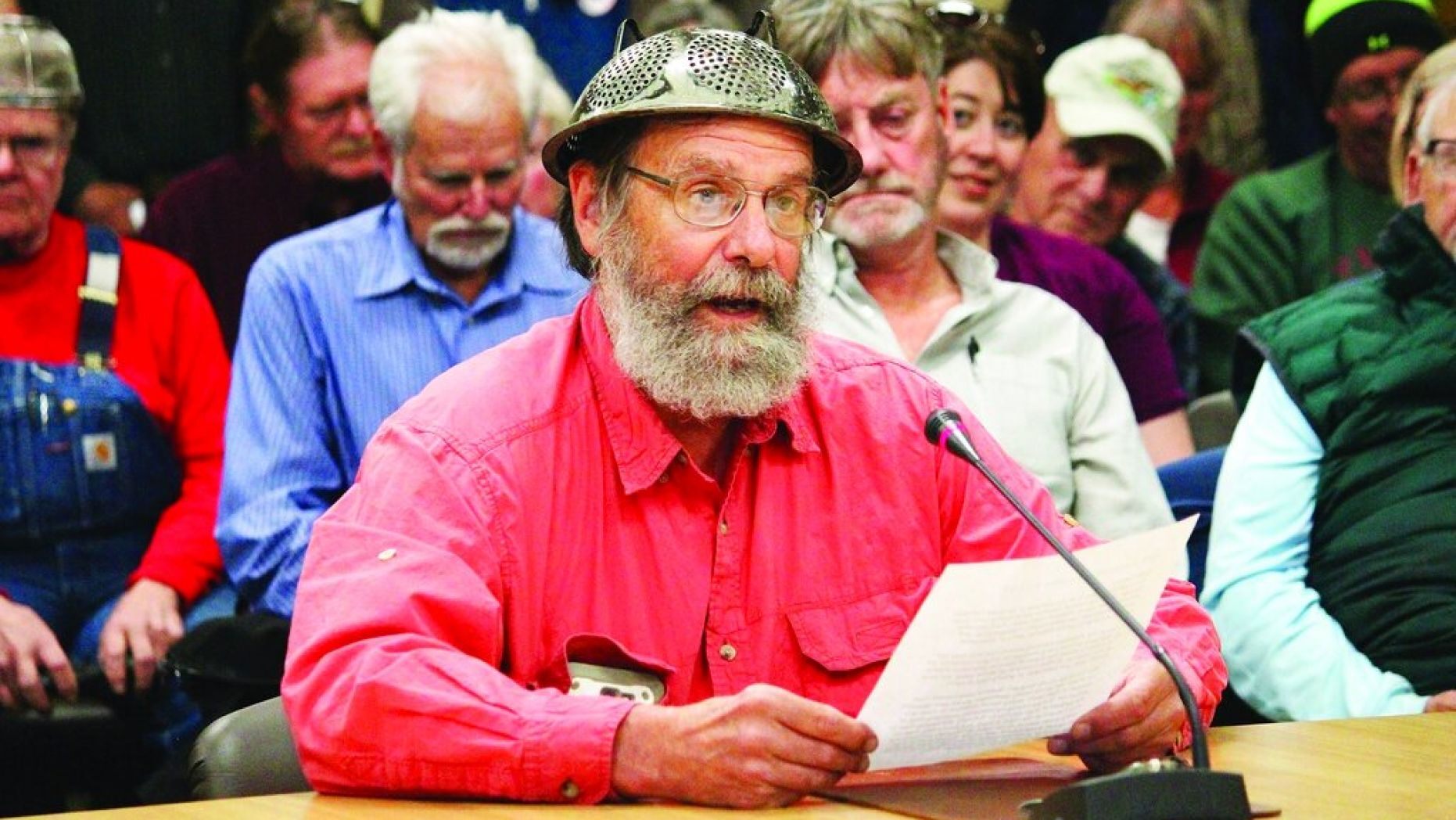 Fritz Creek area resident Barrett Fletcher gives the invocation before a Kenai Peninsula Borough Assembly meeting as a representative of the Church of the Flying Spaghetti Monster at Homer City Hall in Homer, Alaska
