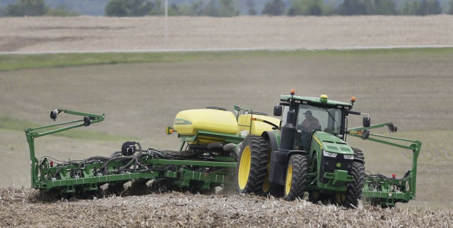 FILE - In this May 23, 2019, file photo, a farmer plants soybeans in a field in Springfield, Neb.