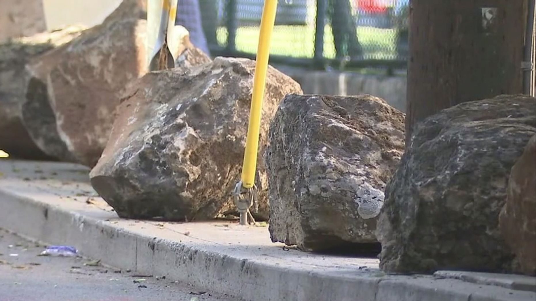 A group of neighbors in San Francisco has had two dozen boulders placed along a residential road to deter people from camping out.