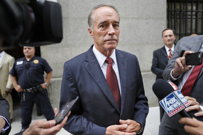Rep. Chris Collins (R-N.Y.) speaks to reporters as he leaves the courthouse after a pretrial hearing in his insider trading case on Sept. 12 in New York.