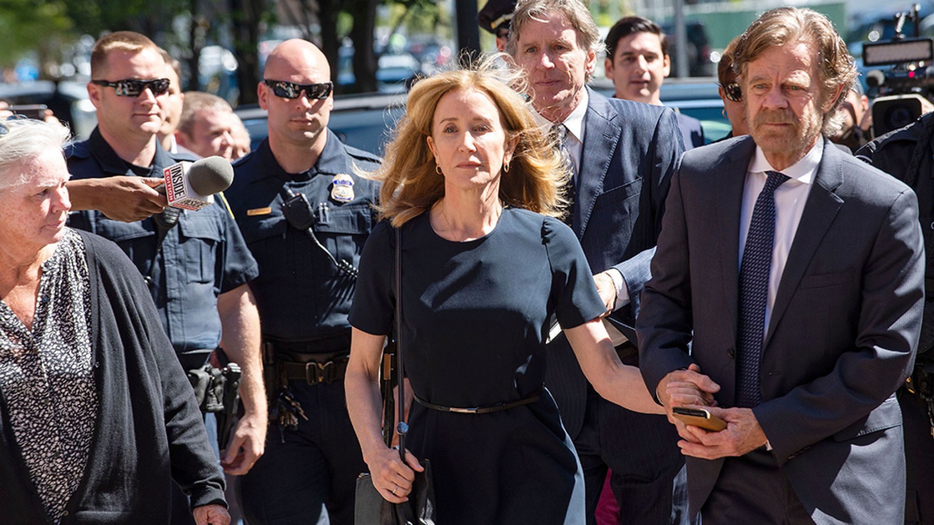 Felicity Huffman and husband William H. Macy make their way to the entrance of the John Joseph Moakley United States Courthouse on Friday, September 13, 2019.