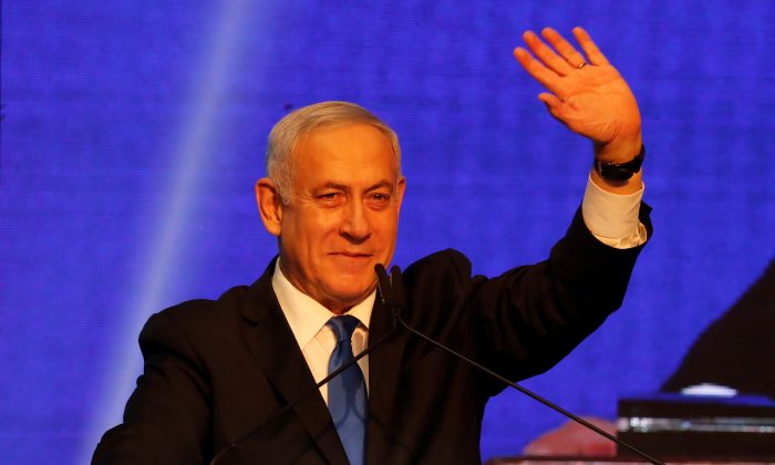 Israeli Prime Minister Benjamin Netanyahu arrives at the Likud party headquarters following the announcement of exit polls during Israel's parliamentary election in Tel Aviv, Israel on Sept. 18, 2019.