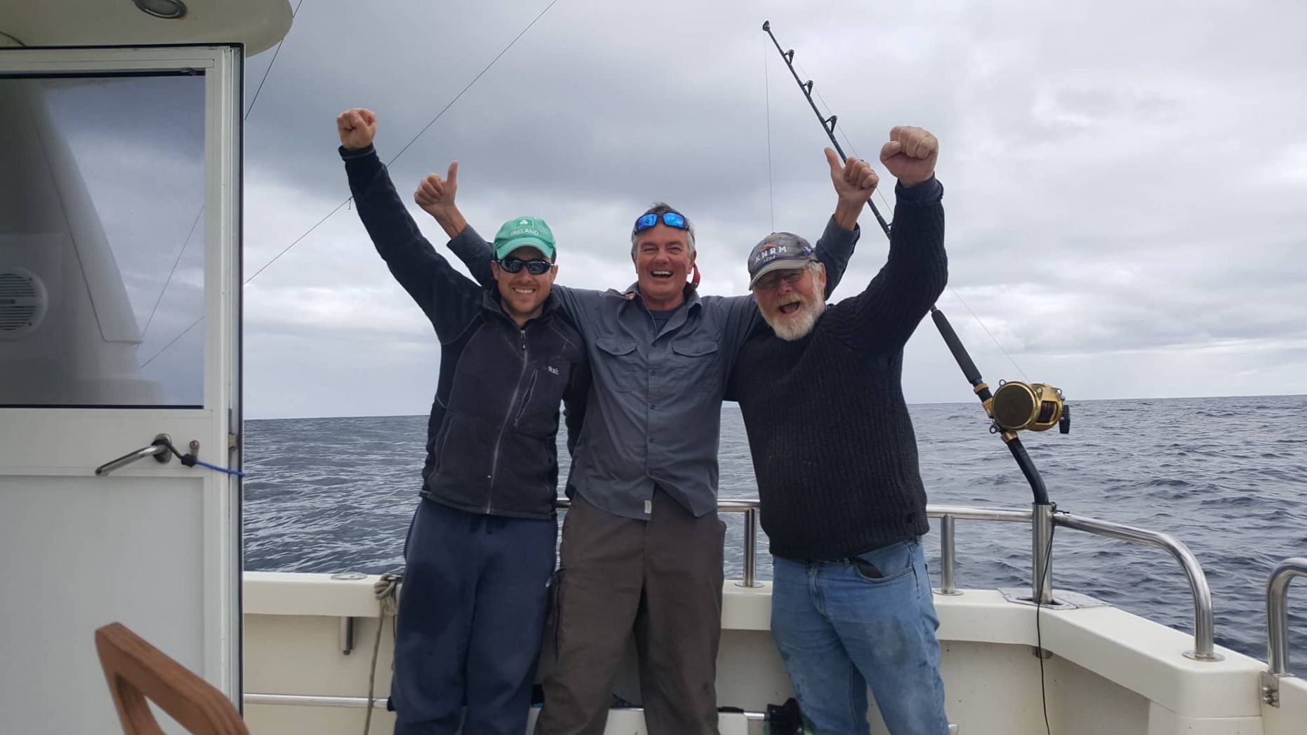 Darren O'Sullivan (left), David Edwards (center) and Henk Veldman (right) were able to catch, tag and release the first-ever bluefin tuna in waters off the south coast of Ireland.