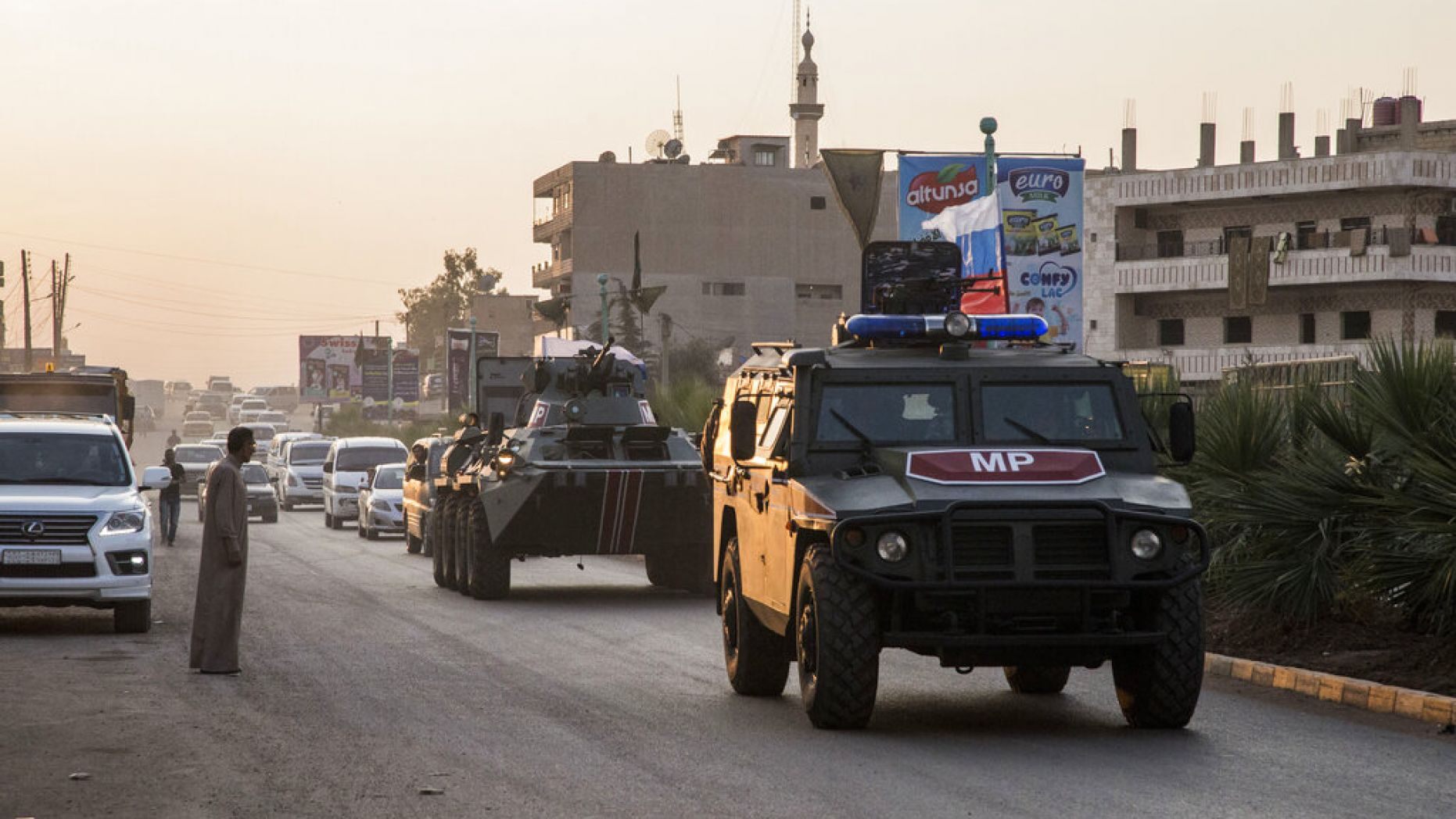 Russian forces patrol in the city of Amuda, north Syria, Thursday, Oct. 24, 2019. 