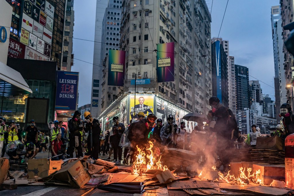 HONG KONG, CHINA - OCTOBER 6: Pro-democracy protesters set barricade on fire at a demonstration in Causeway Bay district on October 6, 2019 in Hong Kong, China.