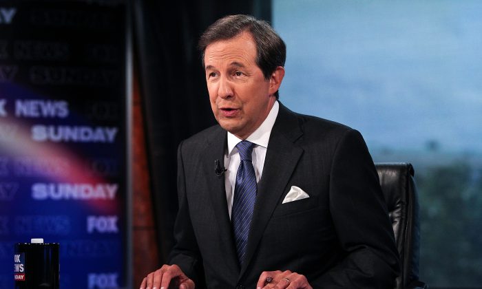 Chris Wallace takes part in an interview with U.S. Supreme Court Justice Antonin Scalia on "FOX News Sunday" at the FOX News D.C. Bureau on July 27, 2012 in Washington, DC.