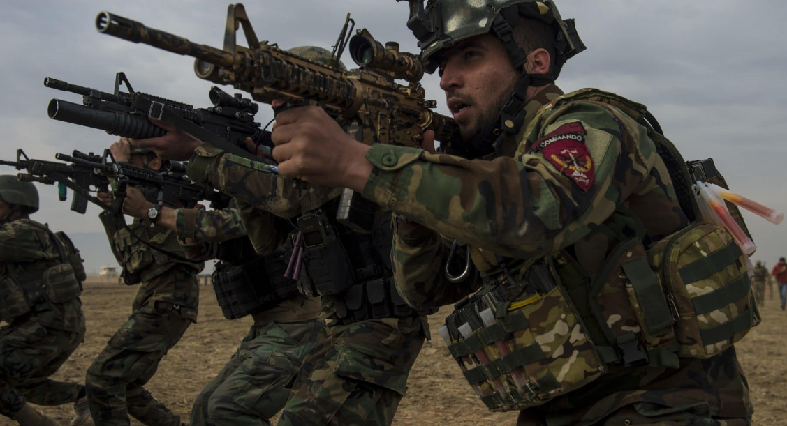 An Afghan National Army Commando squad conducts live fire exercises during training at Camp Pamir, Kunduz province, Afghanistan, Feb. 13, 2018. Commandos spearheaded the Afghan National Army 20th Division's clearance of 25 square miles of terrain in Balkh province, Feb, 24-26.