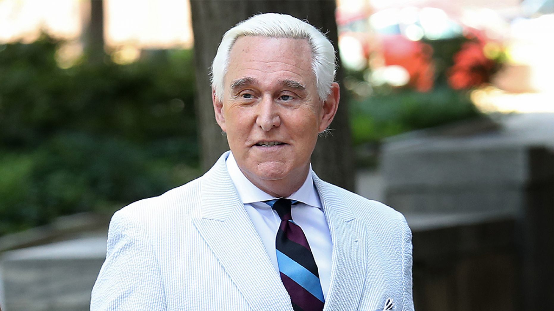 Roger Stone (R), the former adviser to U.S. President Donald Trump, arrives at the E. Barrett Prettyman United States Court House with his wife Nydia Stone (L) on July 16, 2019 in Washington, DC. 