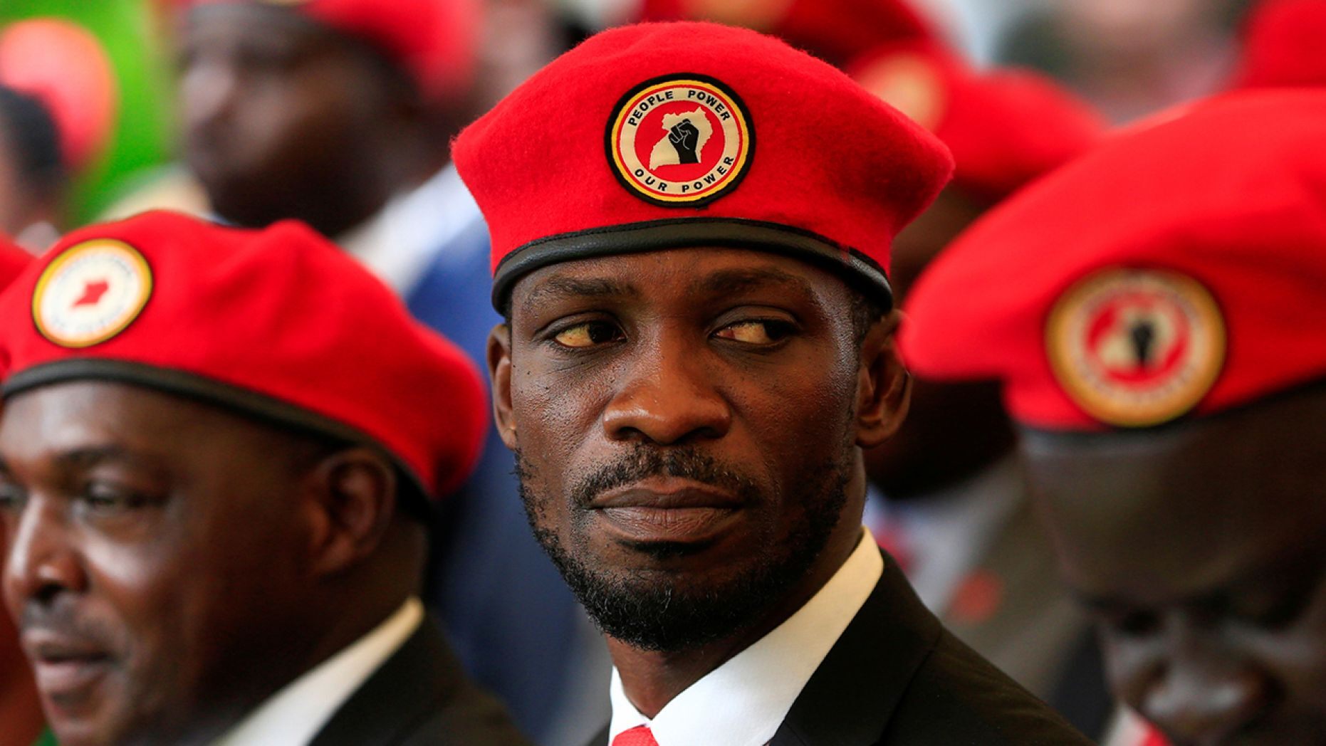 Wine, a musician turned politician, has called the government's ban on his red berets "a sham."