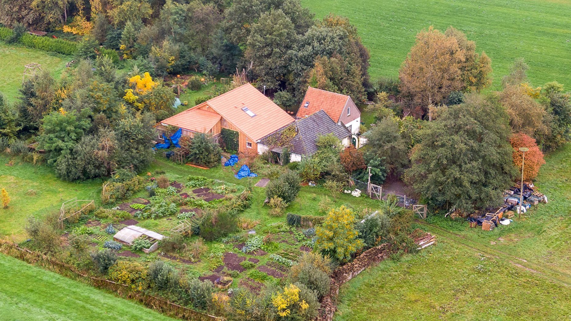 An aerial picture taken on October 15, 2019 shows a view of the farm where a father and six children had been living in the cellar, In Ruinerwold, northern Netherlands.