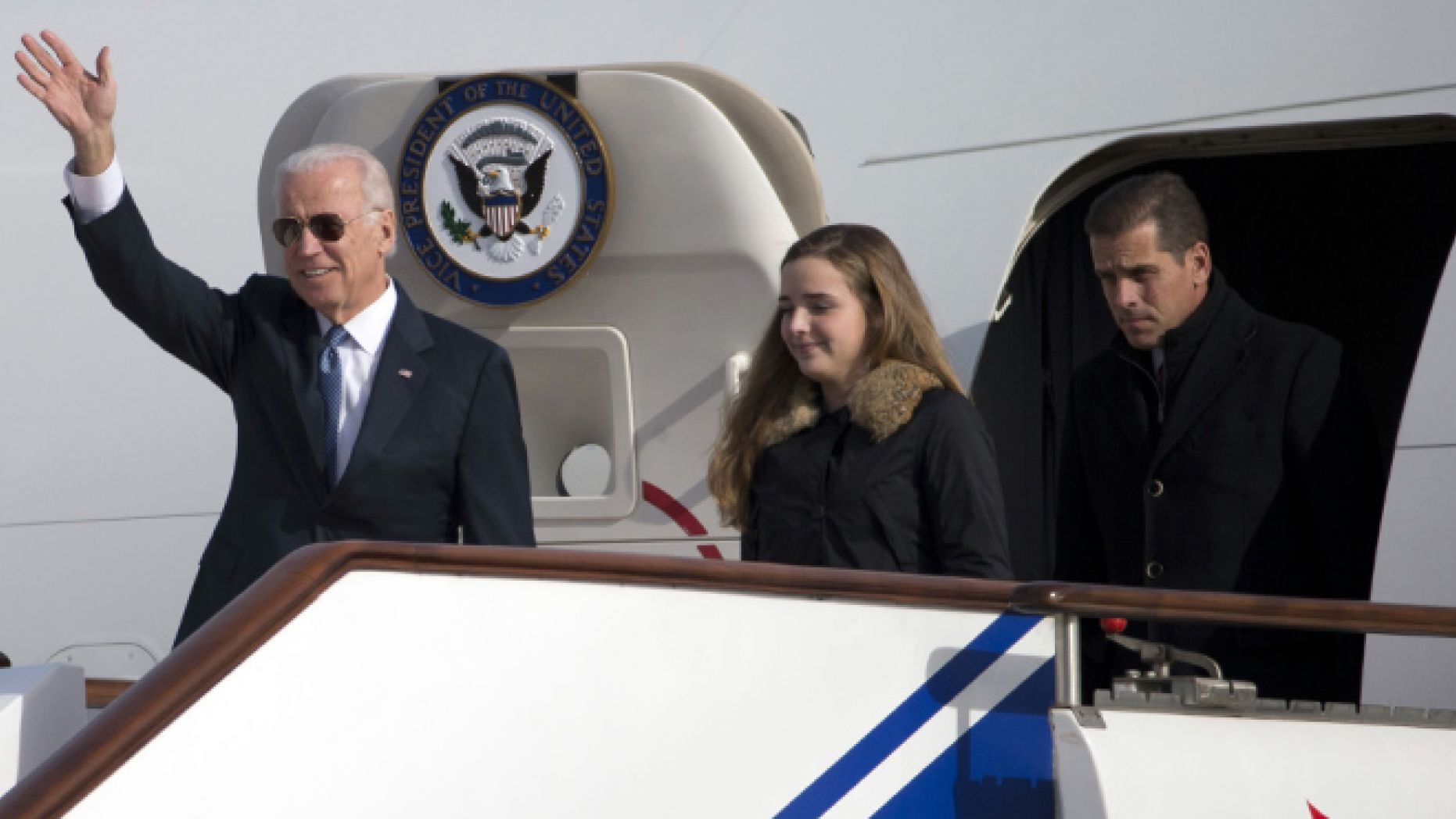 FILE: Dec. 4, 2013: from left, Vice President Joe Biden, granddaughter Finnegan Biden, son Hunter Biden, arriving in Beijing, China.