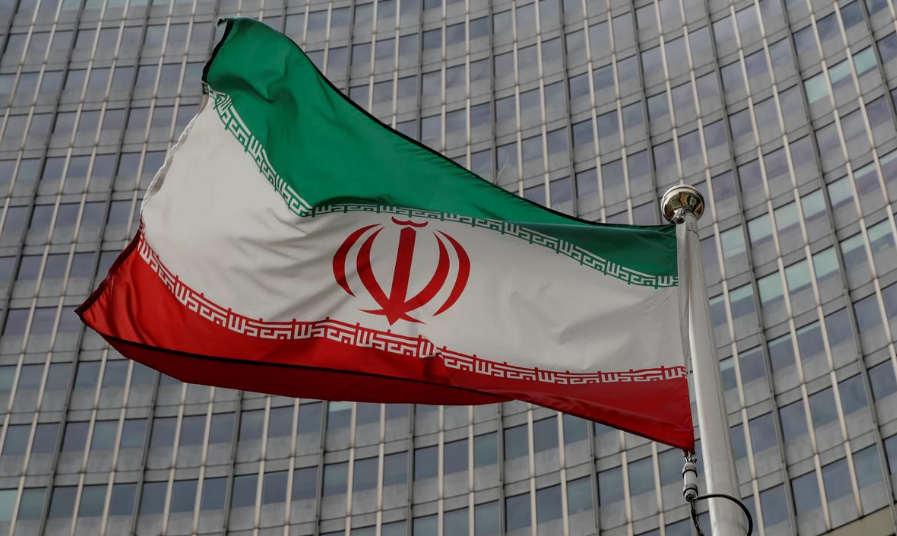 FILE PHOTO: An Iranian flag flutters in front of the International Atomic Energy Agency (IAEA) headquarters in Vienna, Austria September 9, 2019.