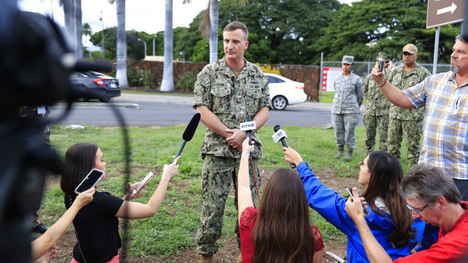 U.S. Navy Rear Adm. Robb Chadwick speaks to the media at the main gate at Joint Base Pearl Harbor-Hickam, Wednesday, Dec. 4, 2019, in Hawaii, following a shooting.