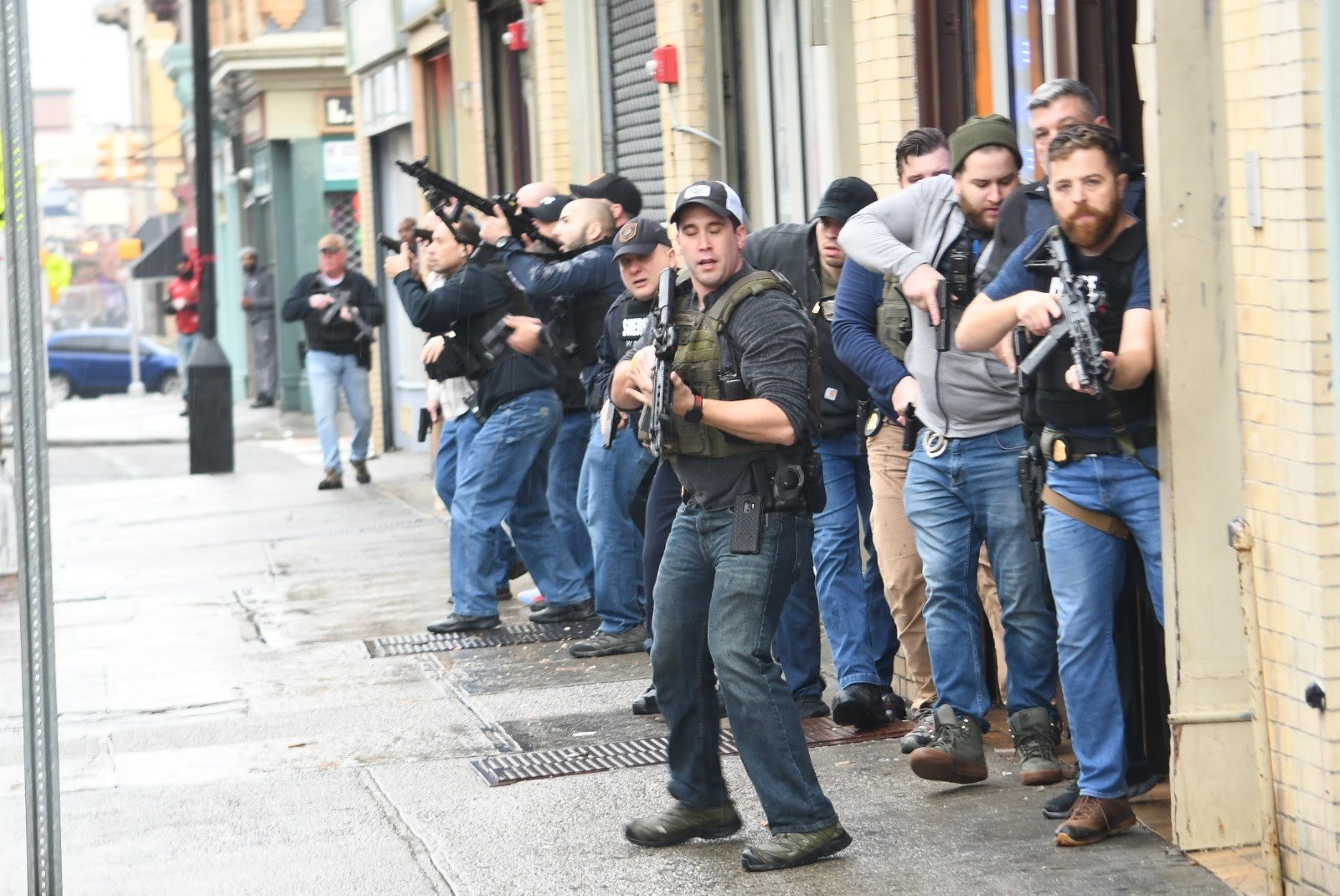 Jersey City police respond to the active shooter scene at Martin Luther King Drive and Bidwell Avenue on Tuesday, Dec. 10, 2019.