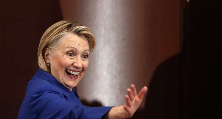 Former Secretary of State Hillary Clinton waves to well-wishers following an appearance at Barnard College with New York Governor Andrew Cuomo, Monday, Jan. 7, 2019.