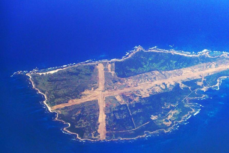 Japan's government will convert an uninhabited, three square-mile island in the East China Sea for use by aircraft carrier-based U.S. pilots, government sources revealed on Monday. 