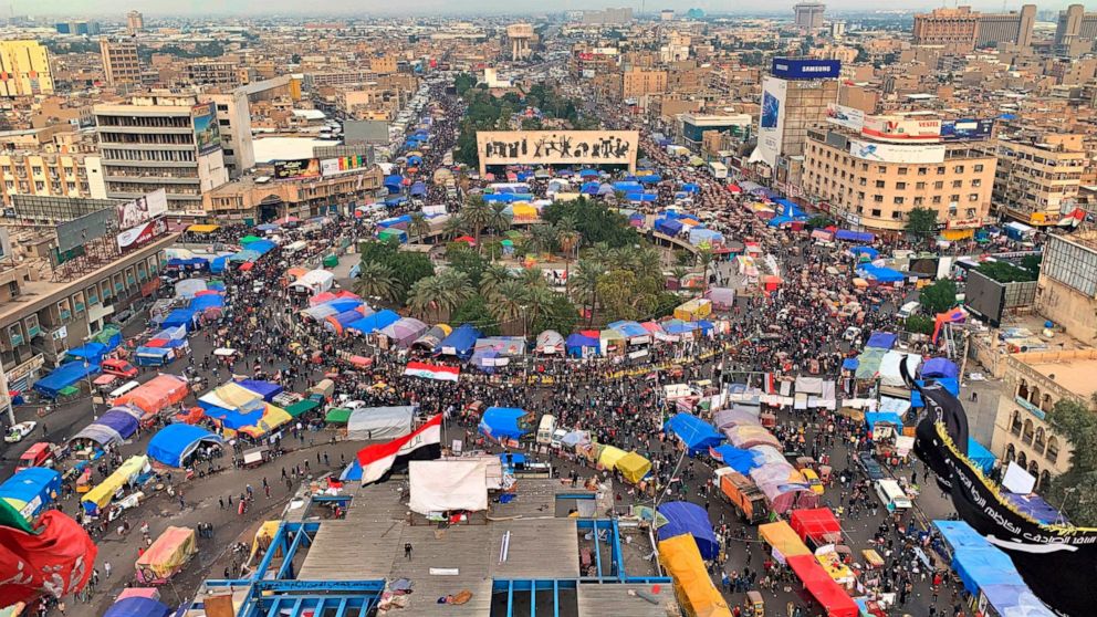 Anti-government protesters gather in Tahrir Square during ongoing protests in Baghdad, Iraq, Tuesday, Dec. 10, 2019.