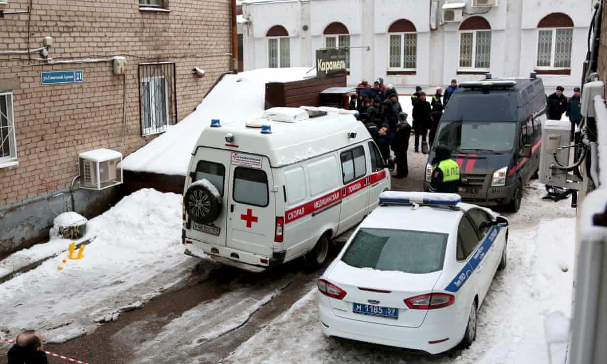 Emergency services at the Karamel hotel in Perm, Russia, after a hot water pipe burst, killing five people.
