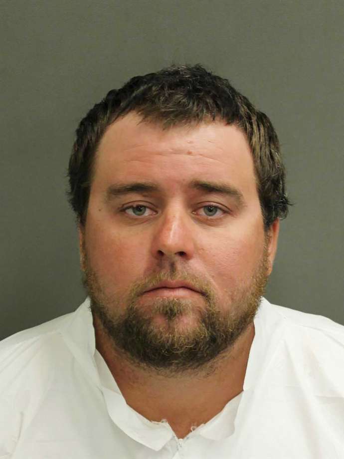 In this Monday, Jan. 20, 2020, booking photo provided by the Orange County Sheriff's office is Mason Toney. Toney, 28, was charged with first-degree murder for the killing of his boss.