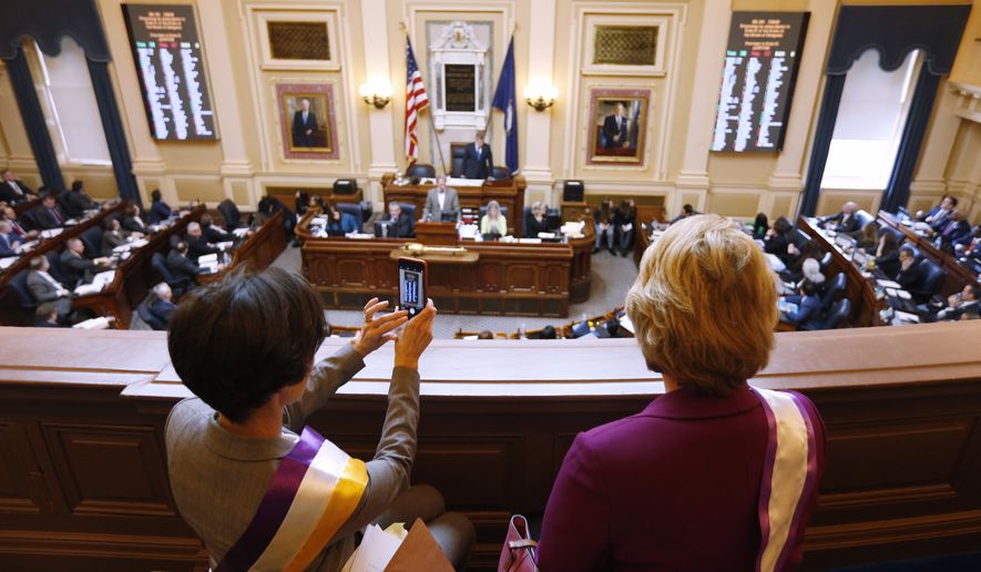 State Sens. Jennifer Boysko, D-Fairfax, left, and Janet Howell, D-Fairfax, watch a vote on a resolution that would bring the Equal Rights Amendment to the floor of the House at the Capitol in Richmond, Va., Thursday, Feb. 21, 2019. The resolution failed. 