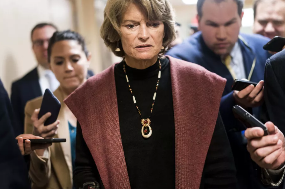 Sen. Lisa Murkowski (R-AK) speaks to journalists while walking to the Senate floor on Capitol Hill in Washington, DC, on January 24, 2019. 