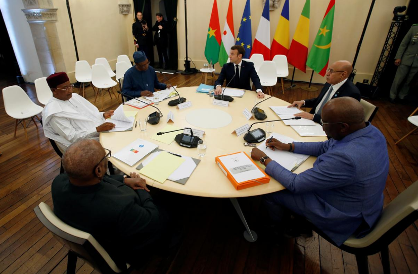 French President Emmanuel Macron, Mali's President Ibrahim Boubacar Keita, Burkina Faso's President Roch Marc Christian Kabore, Niger President Mahamadou Issoufou, Mauritania's President Mohamed Ould Cheikh El Ghazouani and Chad's President Idriss Deby attend a meeting during a summit on the situation in the Sahel region in the southern French city of Pau, France, January 13, 2020. 
