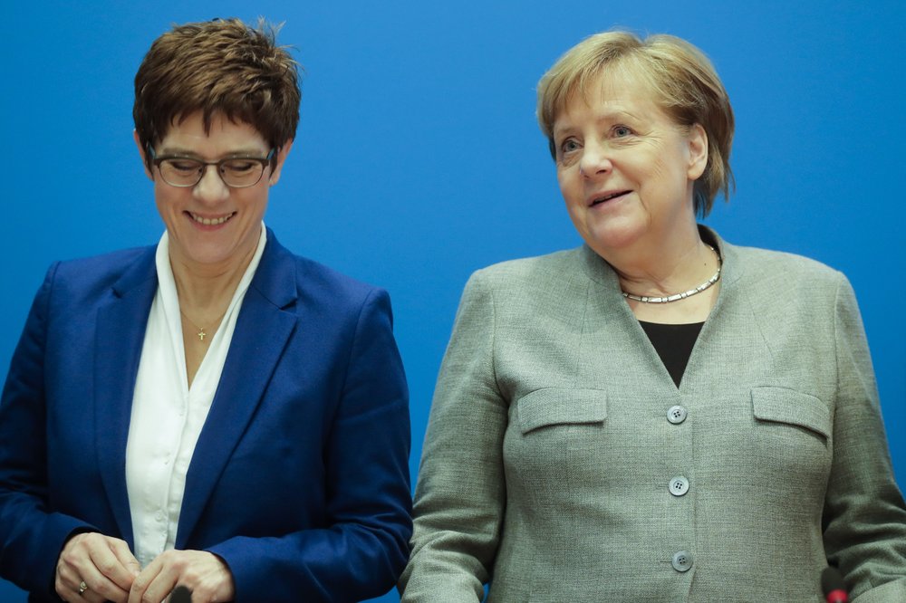 German Chancellor Angela Merkel, right, and CDU party chairwoman and Defense Minister Annegret Kramp-Karrenbauer, left, attend a party's board meeting at the headquarters in Berlin, Germany, Monday, Feb. 10, 2020. Angela Merkel's designated successor Annegret Kramp-Karrenbauer will quit her role as head of the Germany's strongest party in summer and won't stand for the chancellorship.
