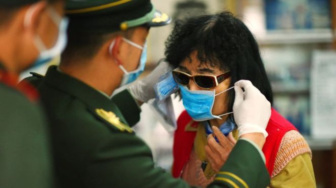 China stepped up security at Shenzhen, where thousands queued to cross into Hong Kong.