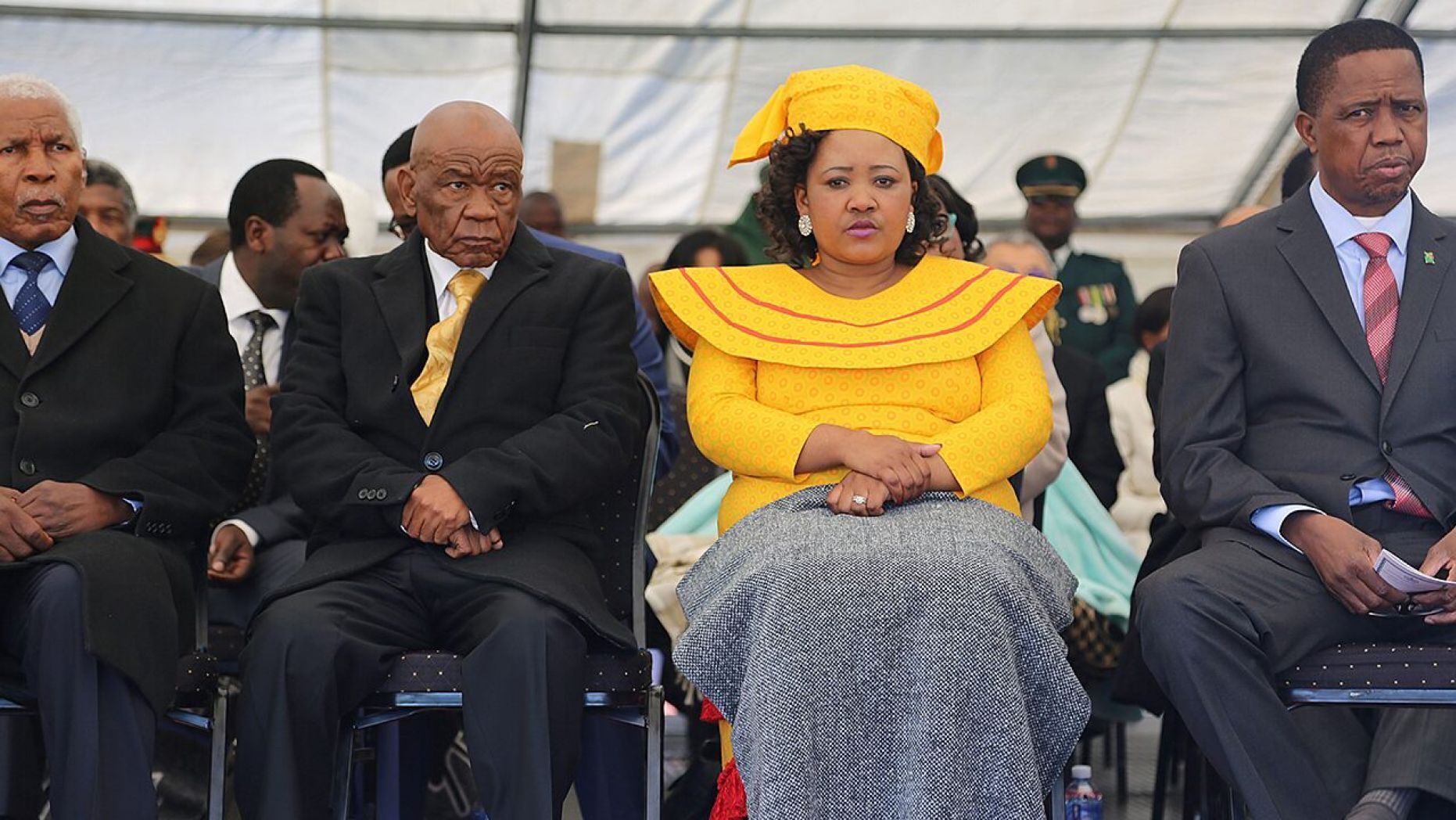 Newly appointed Lesotho prime Minister Thomas Thabane, left, leader of the All Basotho Convention (ABC) political party, his wife 'Ma Isaiah Ramoholi Thabane and Zambian President Edgar Lungu, right, attend Thabane's inauguration. 