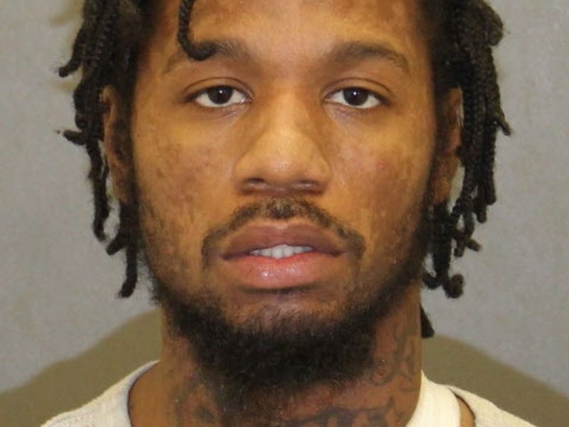 Epenetus Henrique, 28, was charged with first-degree murder following the killing of his roommate, Isaiah Drummond, 30. (Baltimore police)