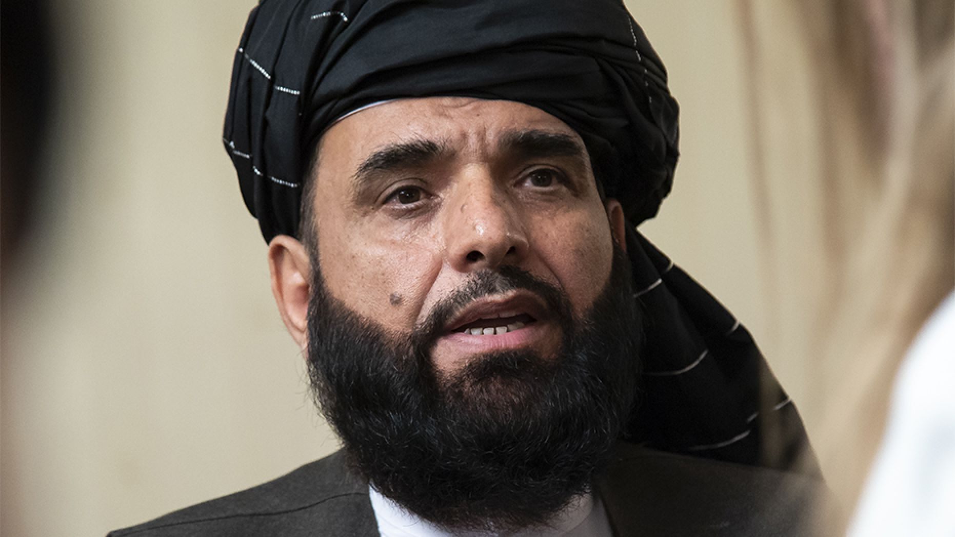 In this 2019 file photo, Suhail Shaheen, spokesman for the Taliban's political office in Doha, speaks to the media in Moscow, Russia. 